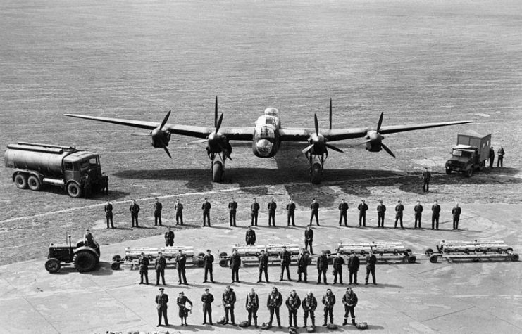 A graphic line-up of all the personnel required to keep one Avro Lancaster of RAF Bomber Command flying on operations, taken at Scampton, Lincolnshire.