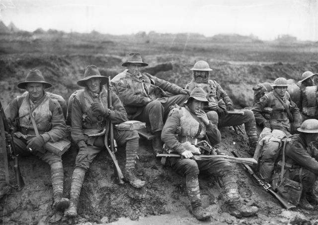 Unidentified members of the Australian 5th Division, enjoying a “smoko” near Mametz, on the Somme.