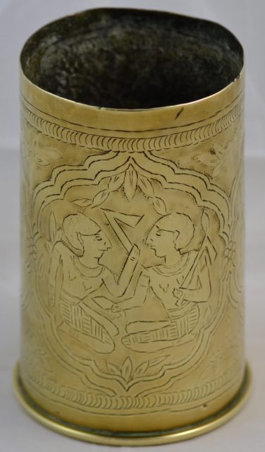German shell case engraved with Egyptian figures obtained as a souvenir by Private Charles Horne who initially served in the Irish Fusiliers and later transferred to the Jewish Legion, the 38th Battalion of the Royal Fusiliers.