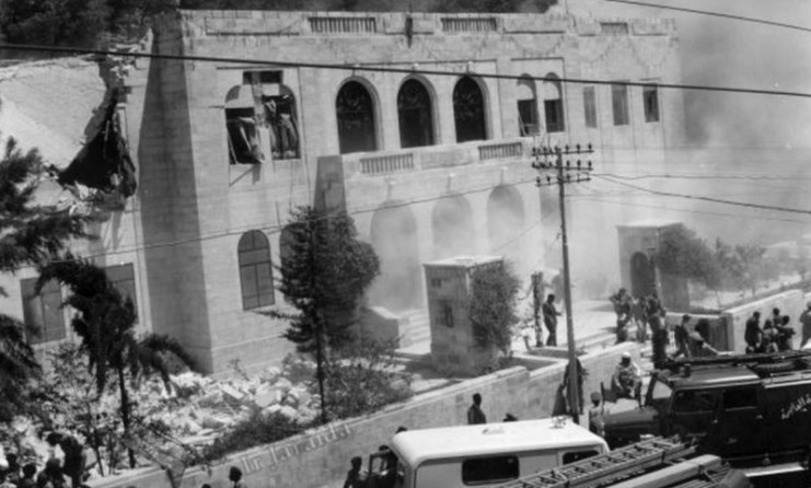 Smoke rising out of the Jordanian government house after the explosion that killed Prime Minister Hazza’ Majali on 29 August 1960.
