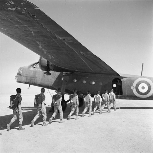 SAS volunteers emplaning into an RAF Bristol Bombay transport aircraft prior to a practice jump while undergoing parachute training at Kabrit, Egypt.