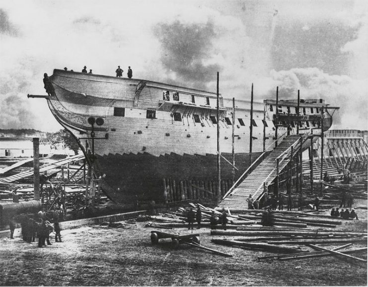 The earliest known photograph of Constitution, undergoing repairs in 1858.