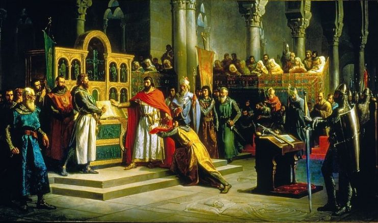 Marcos Giráldez de Acosta painting (1864) depicting the “Santa Gadea Oath”. In the middle of the scene, Alfonso VI (with red cape) is swearing with his right hand on the Bible that he did not take part in the murder of his brother Sancho II, while El Cid stands as a witness in front of him.