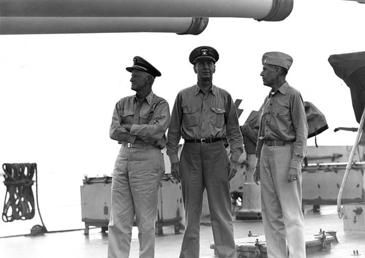 USS Indianapolis (CA 35), off Guam, July 18, 1944. Left to right: Admirals Chester W. Nimitz; Ernest J. King; and Raymond A. Spruance. Indianapolis was Spruance’s flagship.