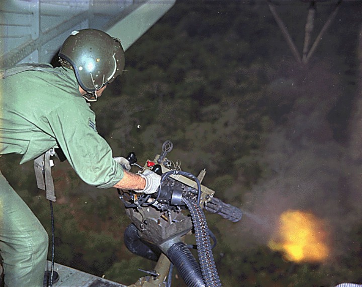 A rotating-barrel Minigun being fired from a gunship during the Vietnam War.