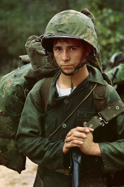 Bullock wasn’t the only youngster to be deployed to Vietnam; Da Nang, Vietnam – A young Marine private waits on the beach during the Marine landing. – August 3, 1965.
