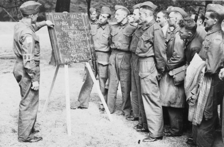 Members of the Local Defence Volunteers being taught simple German phrases.