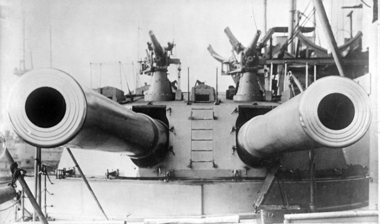 Pair of 12 inch guns on HMS Dreadnought. 2 QF 12 pounder 18 cwt anti-torpedo boat guns are mounted on the turret roof.