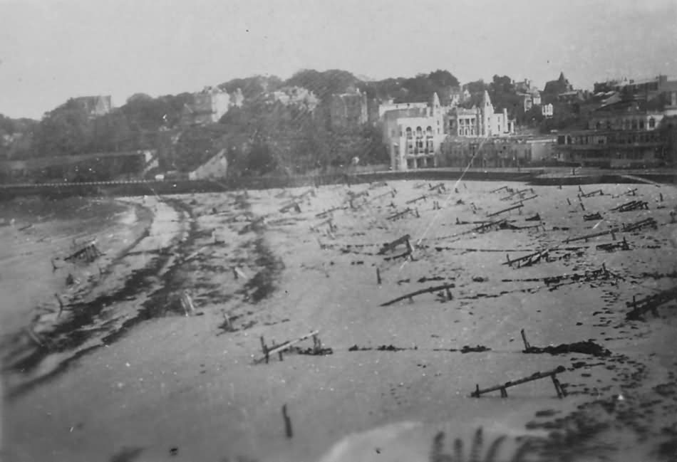 D-Day_Beach_With_Obstacles_And_Debris_Normandy_June_1944