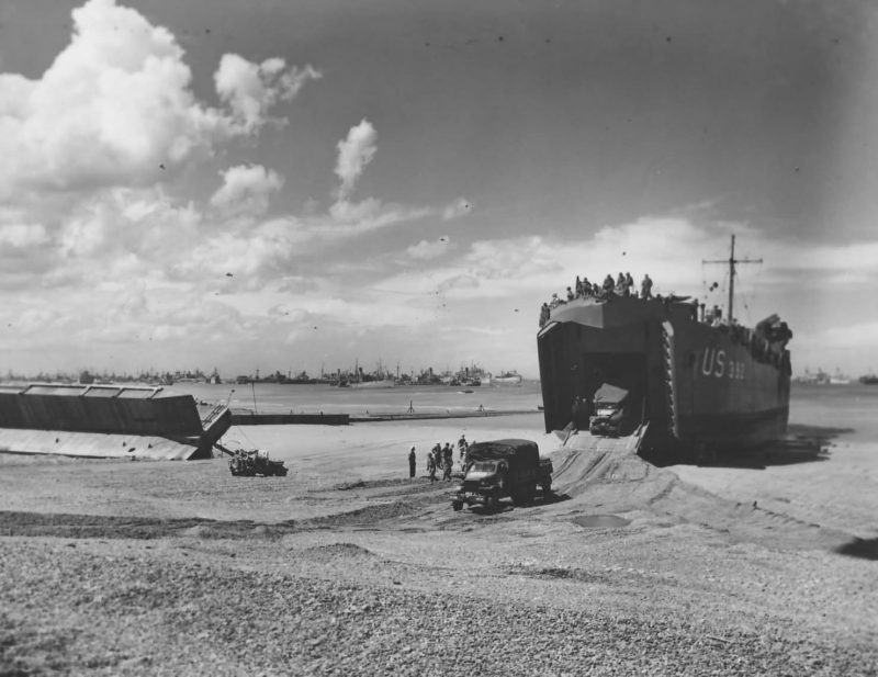 LST_Ship_Unloading_Trucks_D-Day_Beach_Normandy_1944