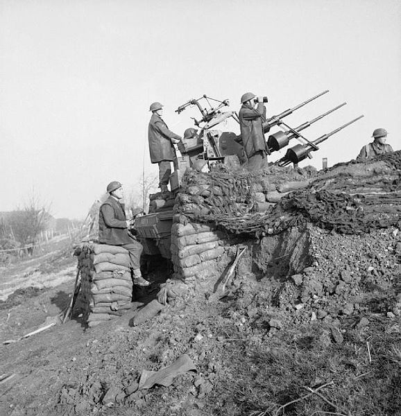578px-British_triple_20mm_anti-aircraft_mounting_on_the_banks_of_the_Rhine,_25_March_1945._BU2125