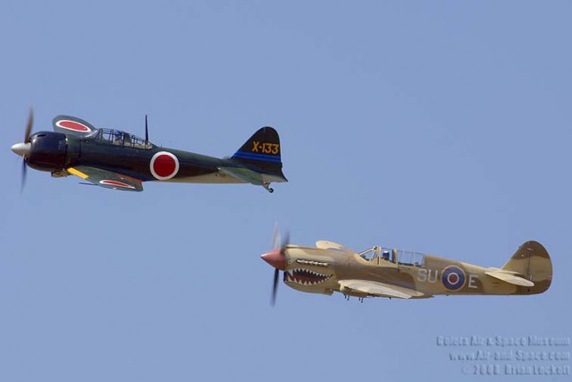 _BEL7407 P-40N NL85104 A6M-3 Model 22 Zero NX712Z left side in flight l