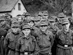 NEVER forget the child soldiers. Facts & sad images of their fight… (some images may be disturbing) Boy_soldiers_captured_by_11th_Armoured_division_at_Kronach_April_25_1945