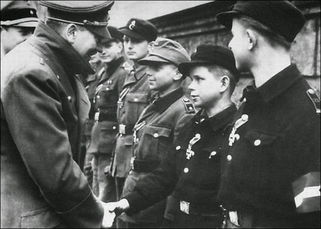 NEVER forget the child soldiers. Facts & sad images of their fight… (some images may be disturbing) Hitler_thanking_children-640x456