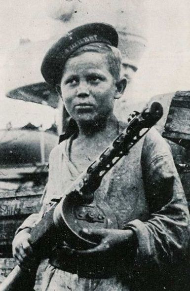 NEVER forget the child soldiers. Facts & sad images of their fight… (some images may be disturbing) Young_Russian