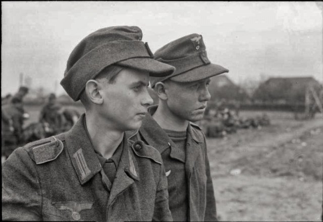 NEVER forget the child soldiers. Facts & sad images of their fight… (some images may be disturbing) Teenage_german_pows_captured_east_of_Rhine_1945_March_26-640x441