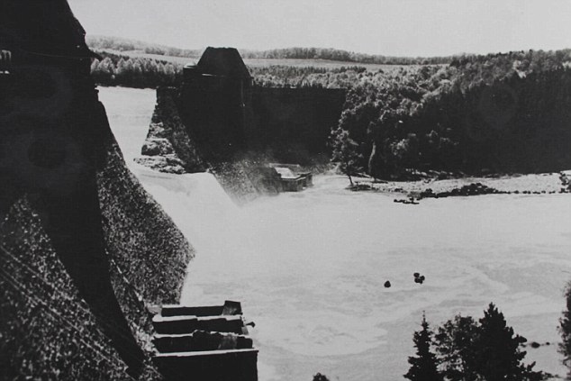 Photograph of the breached Mohne Dam which was bombed by a Lancaster bomber in 1943.  - see Dambusters log book story