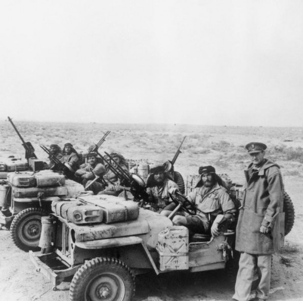 Taken on 18 January 1943, Colonel David Stirling greets a returning SAS jeep patrol