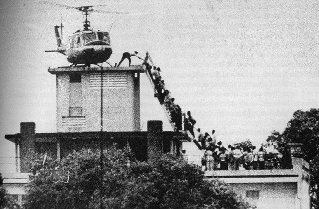 Evacuation of CIA station personnel by Air America on the rooftop of 22 Gia Long Street in Saigon on April 29, 1975. (Wikipedia)
