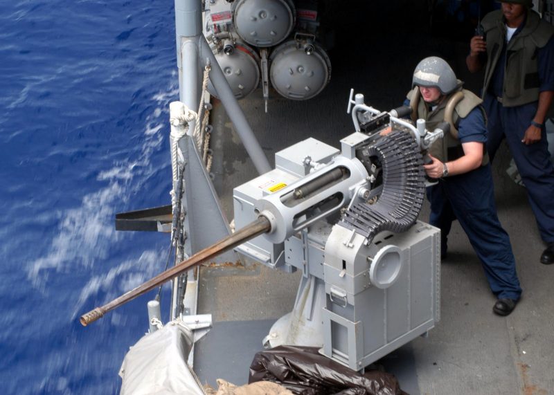 US Navy Sailors Firing the Powerfull Mk38/ M242 Bushmaster on a Boat