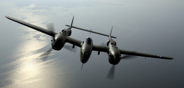 OVER VIRGINIA -- Steve Hinton flies "Glacier Girl," a P-38 Lightning dug out from 268 feet of ice in eastern Greenland in 1992. The aircraft was part of a heritage flight during an air show at Langley Air Force Base, Va., on May 21. (U.S. Air Force photo by Tech. Sgt. Ben Bloker)