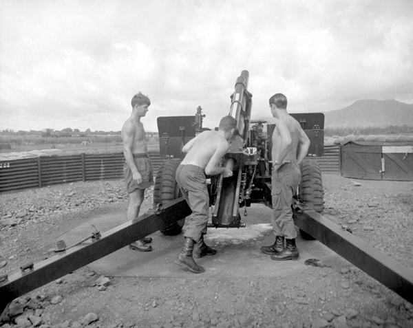 Members of the Royal New Zealand Artillery (RNZA) firing an M2A2 Howitzer