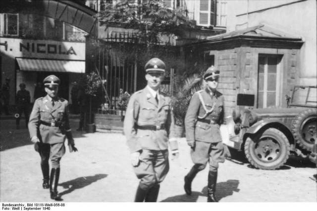 Himmler in Metz, France, visiting the Leibstandarte SS Adolf Hitler. Note the Wanderer W11 in the background.