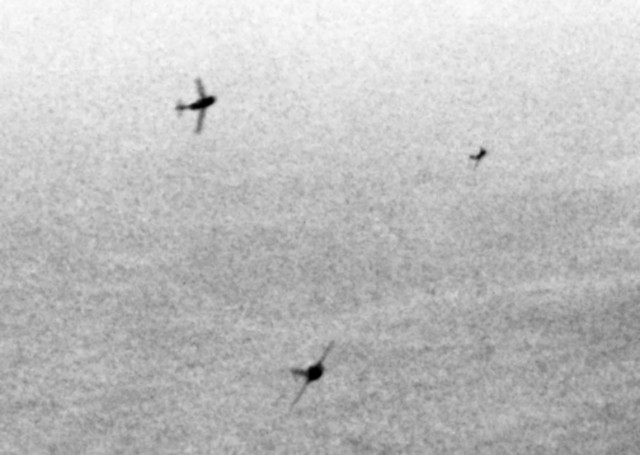 MiG-15s_curving_to_attack_B-29s_over_Korea_c1951