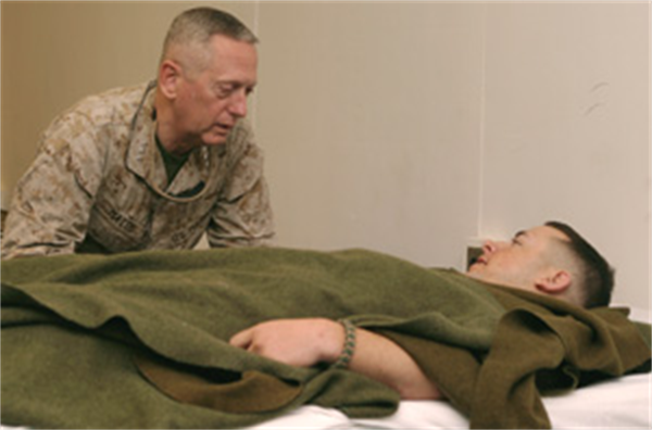 General Mattis visiting a wounded Marine in Iraq via http://www.1stmlg.marines.mil/News/NewsArticleDisplay/tabid/8628/Article/543180/i-mef-commander-visits-taqaddum.aspx - PD 