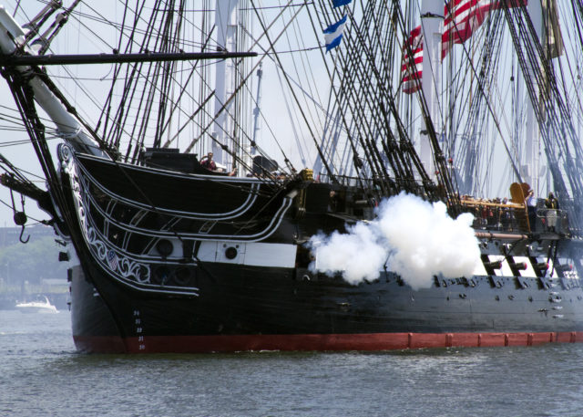USS Constitution fires a 21-gun salute in honor of America's 237th birthday during the ship's annual Fourth of July turnaround cruise. More than 500 guests went underway with Old Ironsides for a three-hour tour of Boston Harbor in celebration of Independence Day. (U.S. Navy photo by Sonar Technician (Submarine) 2nd Class Thomas Rooney/Released)