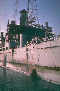 Torpedo damage aboard the USS Liberty via commons.wikimedia.org