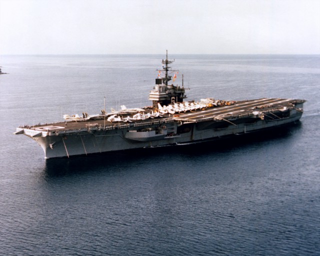 An aerial port bow view of the aircraft carrier USS RANGER (CV-61) underway off the coast of California.