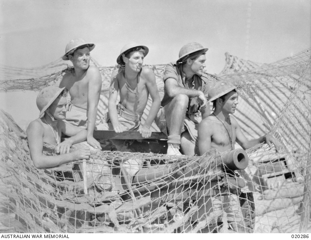 Soldiers of the Australian 2/17th Infantry Battalion posing for the cameras outside Tobruk