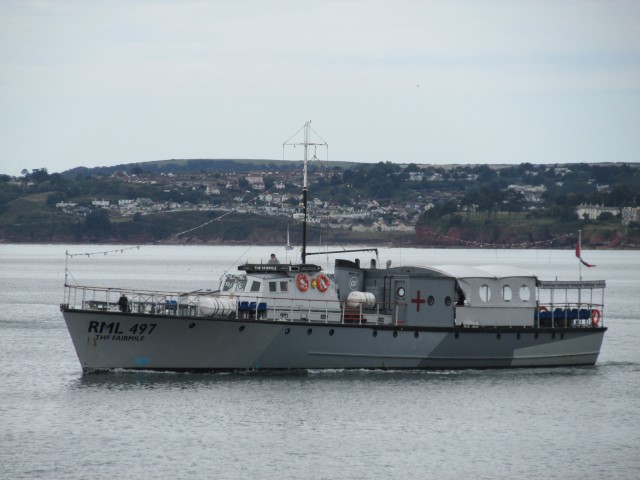 RML 497, then known as MV The Fairmile, pictured sailing on Tor Bay approaching Torquay Harbour. (GTD Aquitaine II/ Wikipedia) 