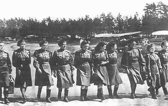 the-women-of-the-588th-night-bomber-regiment-with-their-aircraft-in-the-background