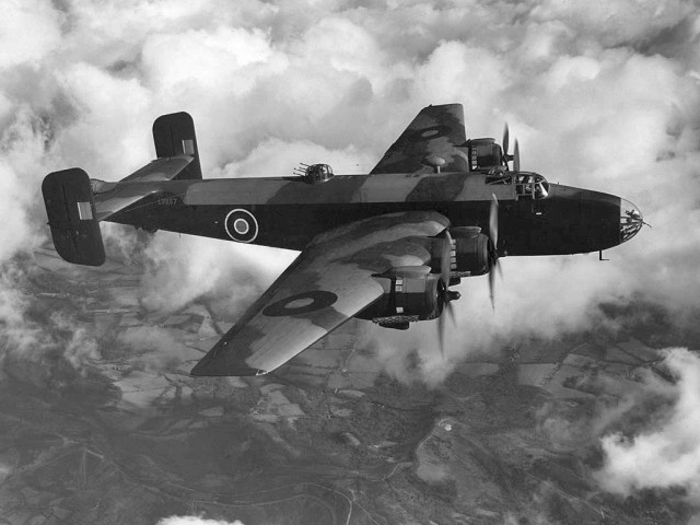 A Halifax bomber in flight via commons.wikimedia.org