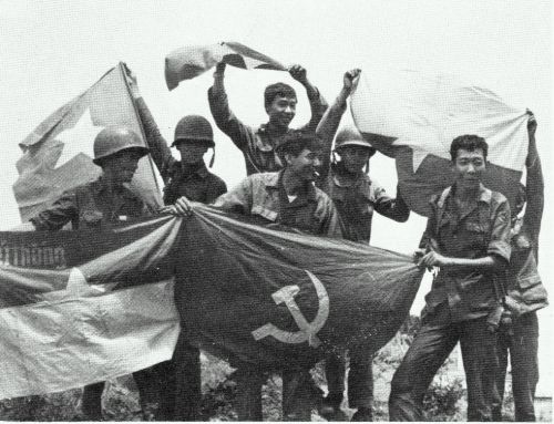 South Vietnamese soldiers posing with captured enemy flags.