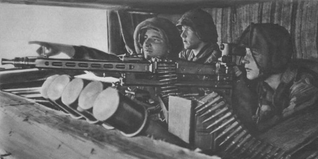 German MG42 machine gun bunker at Omaha Beach, Normandy, France - 1944 (Image).