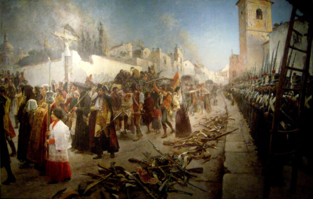 The final defeat of the Spanish troops. As part of the surrender agreement, the spanish garrison was forced to drop their weapons outside of the city walls, then offered a choice of joining Napoleon or rotting in prison. Most chose prison. Source: wiki/public domain.