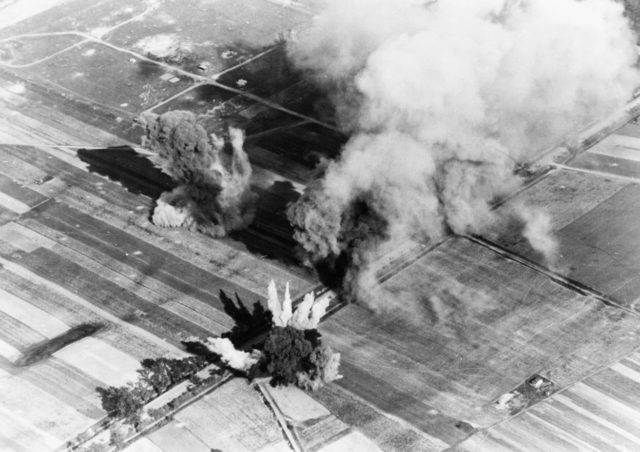 German aerial bombs straddling a road in Poland. September 1939 [U[United States Library of Congress | Public Domain]<figcaption class=