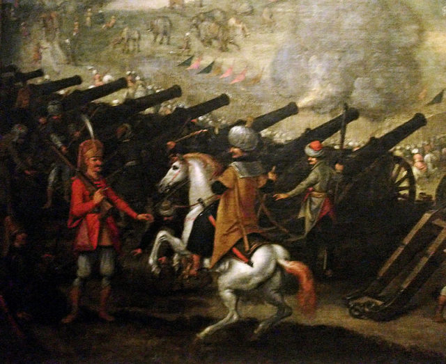  egy Janicsár, egy pasa (nemes) és ágyúütegek Esztergom ostrománál 1543-ban. Sebastian Vrancx - saját munka, Uploadalt, CC BY-SA 3.0, 