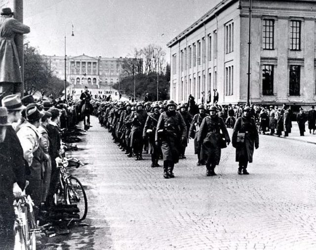 German soldiers marching through Oslo on the first day of the invasion (By Unknown - Norwegian Encyclopedia, CC0, / Wikipedia)
