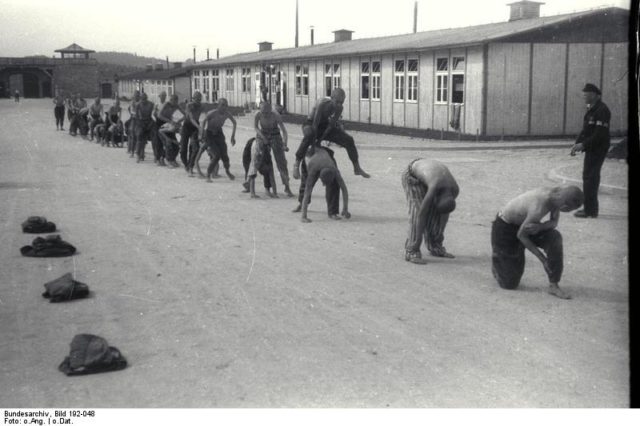 Prisoners seen playing leap frog. Photo credit