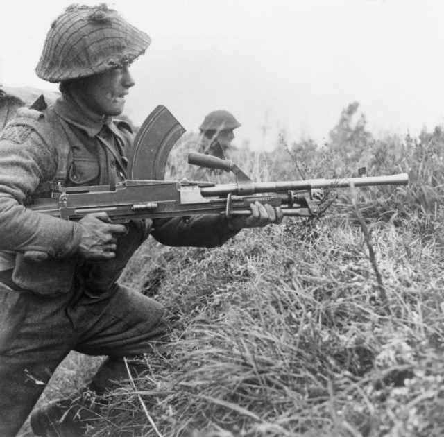 A Royal Scots Gaurdsman taking position with a Bren Light Machine gun. This was the weapon Gurung used to cover the last section as they retreated.