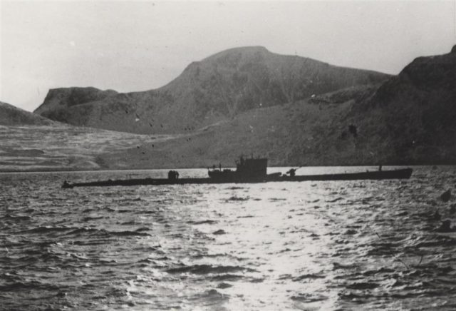 U-537 rides at anchor in Martin Bay (also known as Attinaukjuke Bay) at 60º04’05”N, 64º23’06”W on the Labrador coast of Newfoundland twenty miles south of Cape Chidley on October 23, 1943. Note the absence of the U-boat’s Flakvierling 38 flexible quadruple 2cm anti-aircraft gun mount.