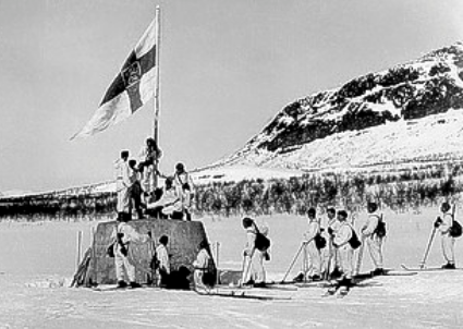 Finnish troops rise the flag at Tripoint Norway Sweden Finland after the end of Lapland war.