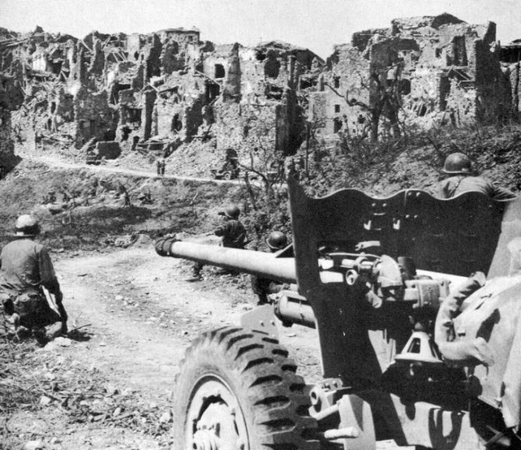 US soldiers with a 57mm M-1 anti-tank gun fighting near Monte Cassino during the initial assault.