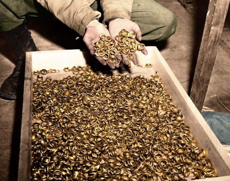 A few of the thousands of wedding rings the Germans removed from Holocaust Victims to salvage the gold. The U.S. troops found rings, watches, precious stones, eyeglasses, and gold fillings, near Buchenwald concentration camp. 5 May 1945. Paul Reynolds / mediadrumworld.com