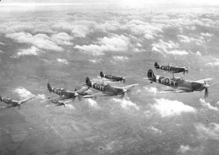 Eight Royal Air Force Supermarine Spitfire Mk IX of No. 611 Squadron (West Lancashire), based at RAF Biggin Hill, London (UK), in 1943. The photo was taken out of a Lockheed Hudson as a public relations photo over Biggin Hill.
