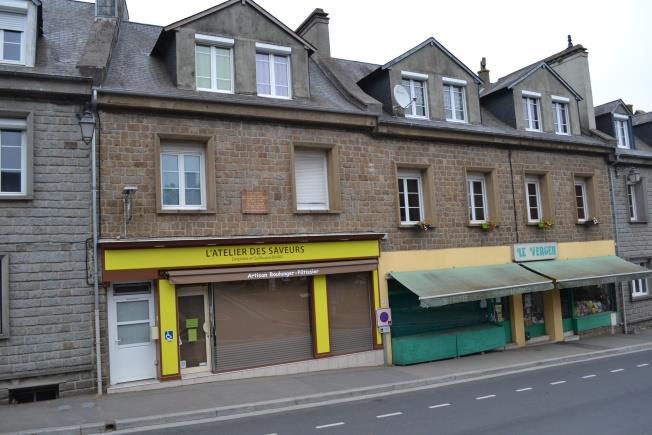 And today – still a bakery with the greengrocers and general store next door and a memorial plaque on the wall above.